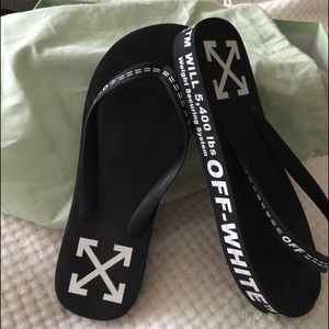 Off-White Black Logo Flip Flops.